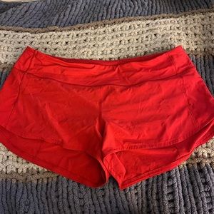 red lululemon shorts
